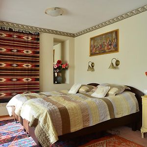 Kamer met een Queen Size Bed